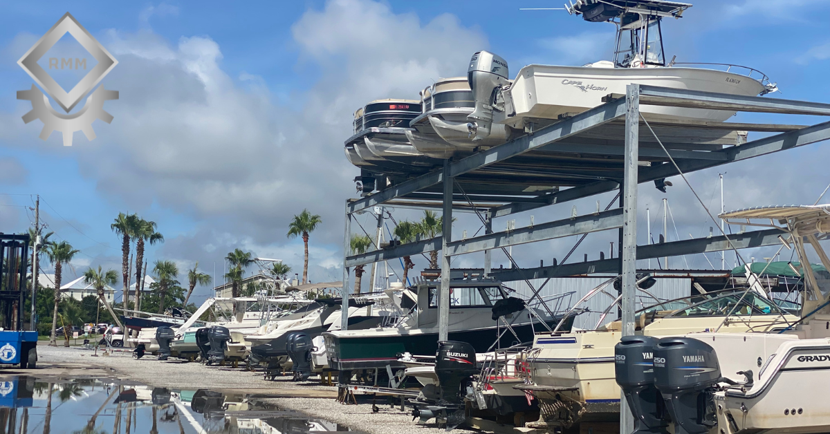 Vessels stored on a multi tier structural steel marine dry rack storage system at a coastal marina facility